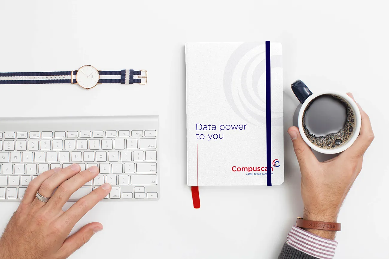 Compuscan website design showing people-centric imagery and messaging